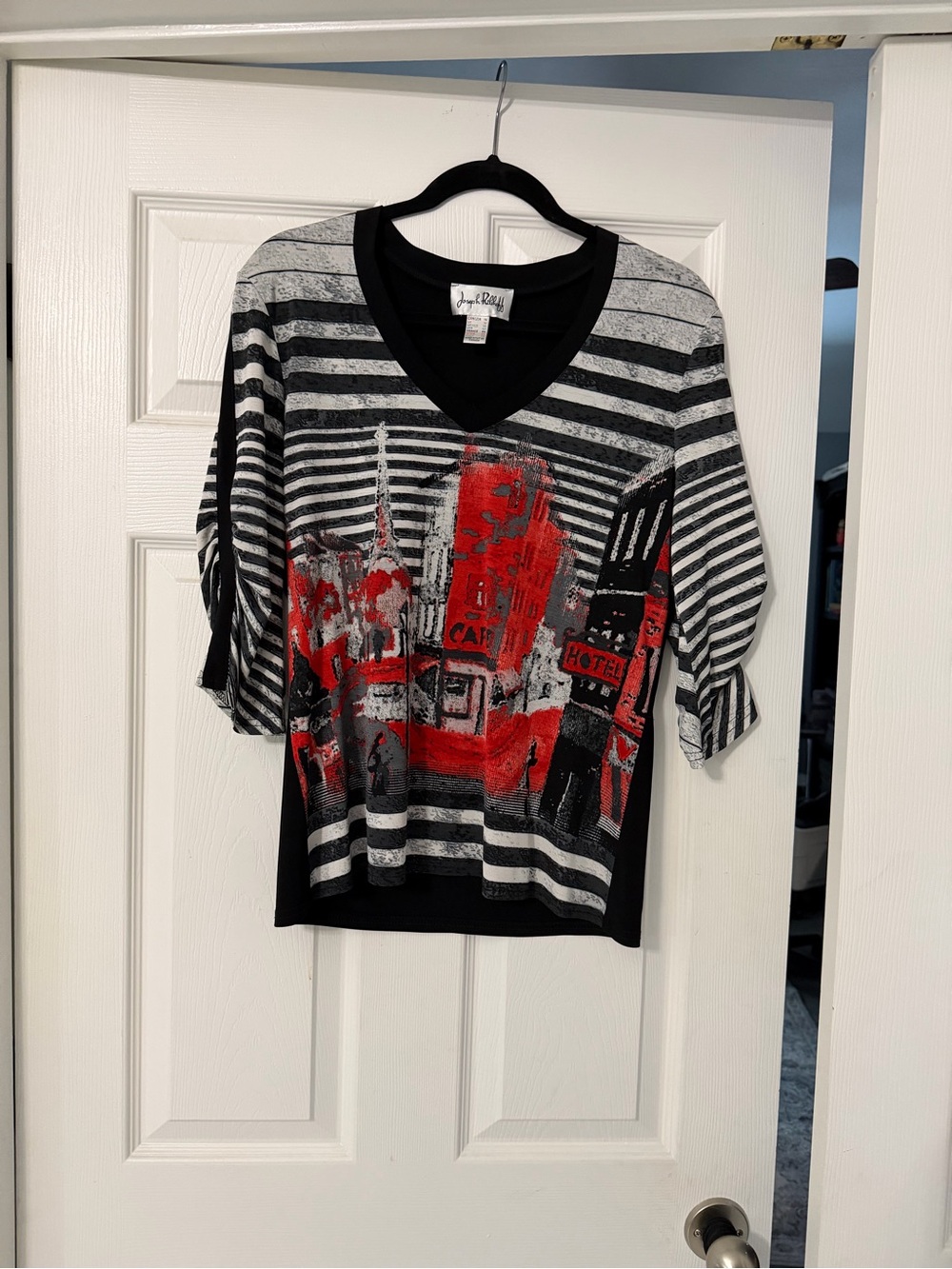 Joseph Ribkoff Black Top with White Label.  Size 10. Not a 14